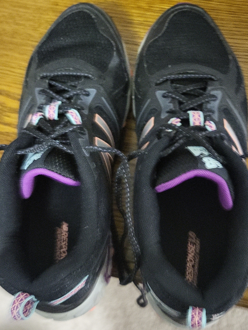 New Balance Women's Black Running Shoes with Purple and Pink Accents